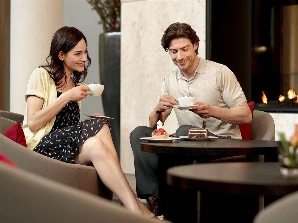 A-Rosa Sylt Hotel List Exterior photo A couple drinking coffee